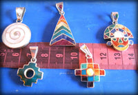 small peruvian inca pendants - silver inlay