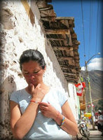 pachamama symbol on red string, sizable peruvian bracelet, unisex gift